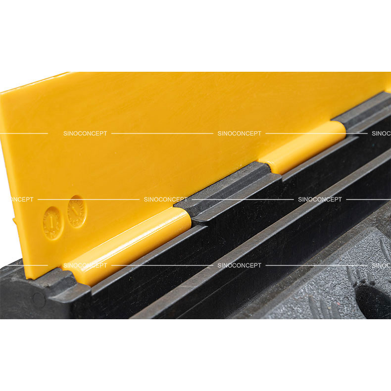 Heavy-duty hinges and reinforced connectors on plastic-rubber composite 2-channel cable ramp.