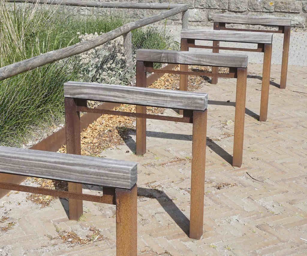 Floor-mounted cycle racks for bike parking.