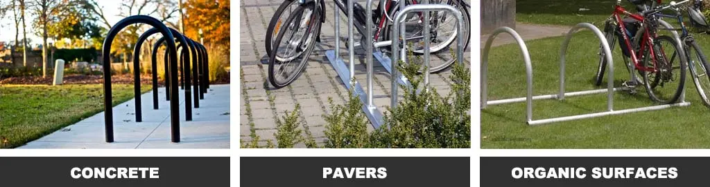 Black harrogate cycle racks on the concrete ground, Sheffield bike racks on pavers, and rail U racks on organic surfaces.