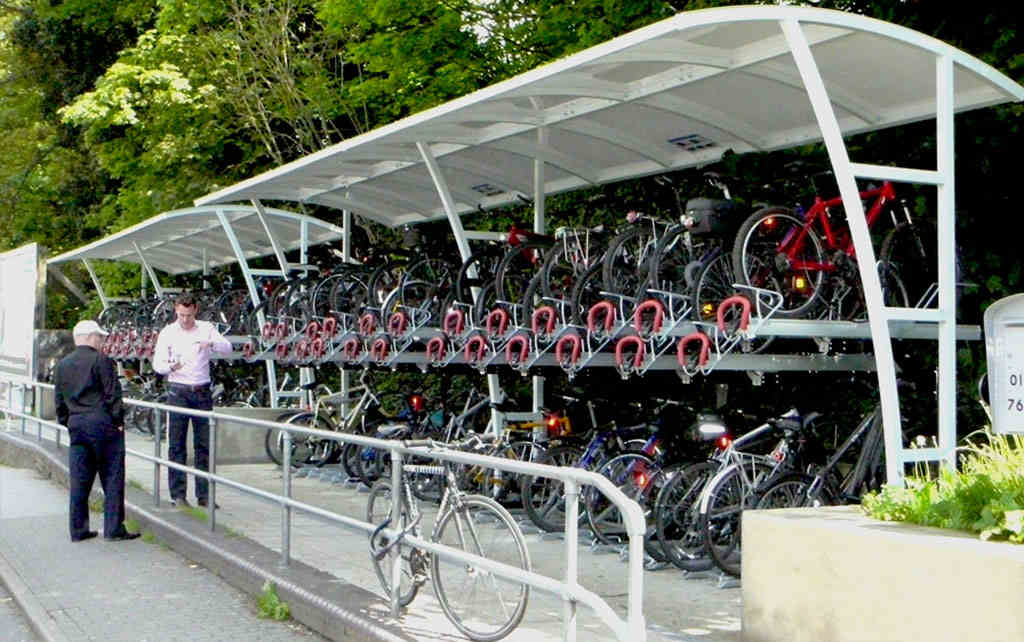 Double-decker cycle racks installed on the ground, which allowing twice as many bikes to be parked in the same space.