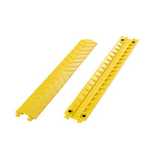 Small-size yellow drop-over cable protectors made of polyurethane, also called drop-over cable ramps used to protect cables.