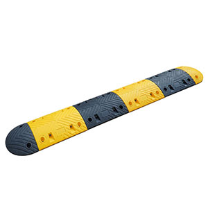 Traffic rubber speed bump of 7cm in height made of yellow and black recycled rubber as a traffic calming device.