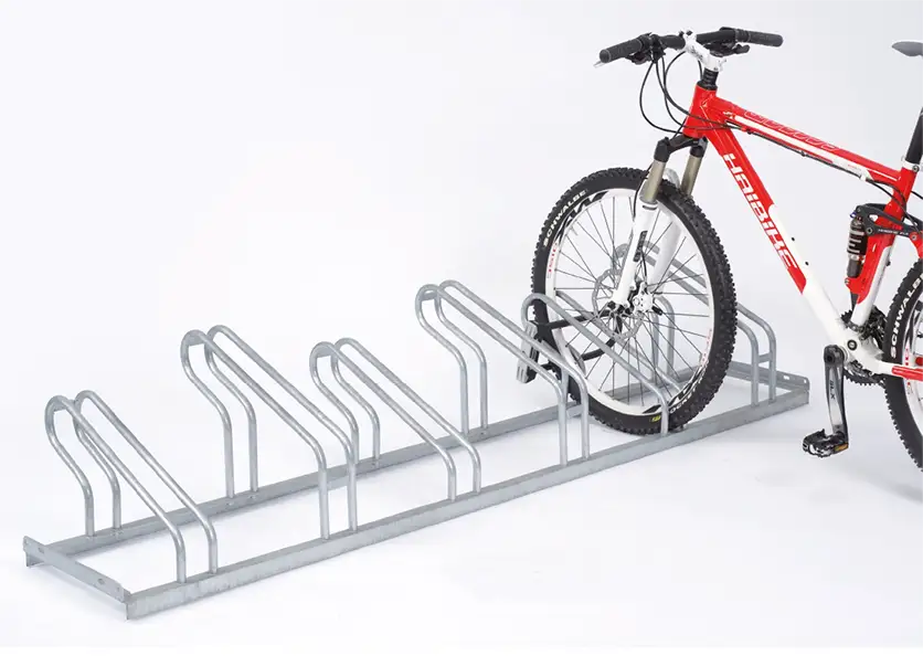 A floor bike rack designed to provide organized and secure storage for bicycles.
