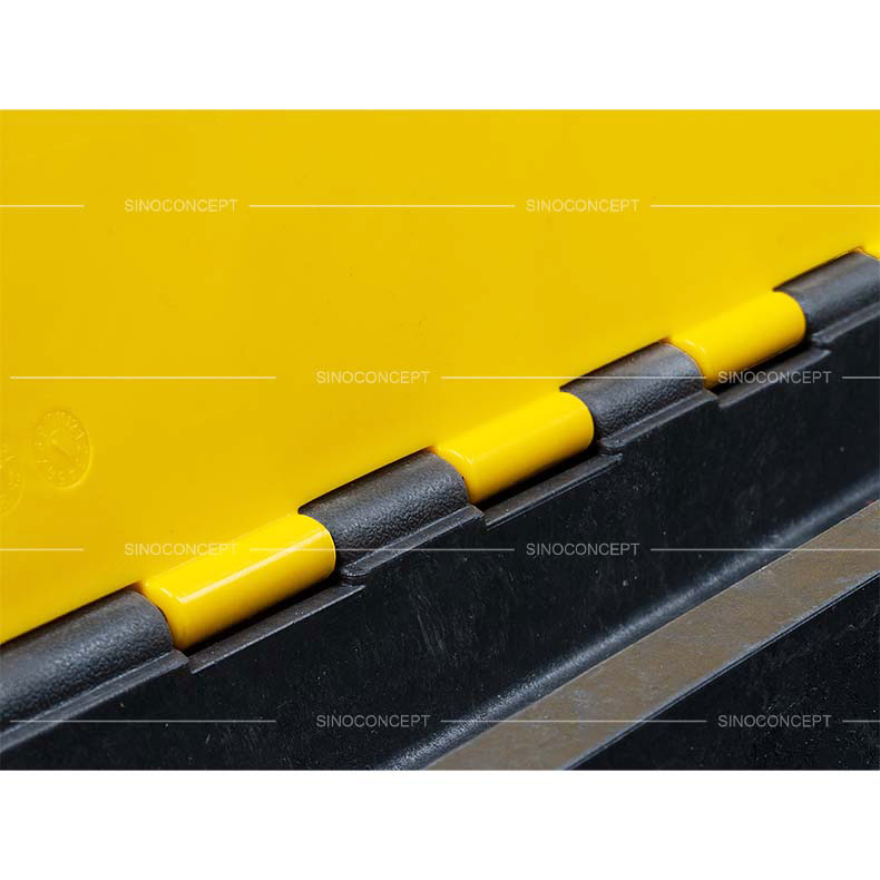 Heavy-duty hinges and reinforced connectors on 3-channel floor cable protector.