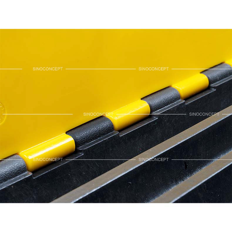 Heavy-duty hinges and reinforced connectors on 5-channel cable protector ramp.