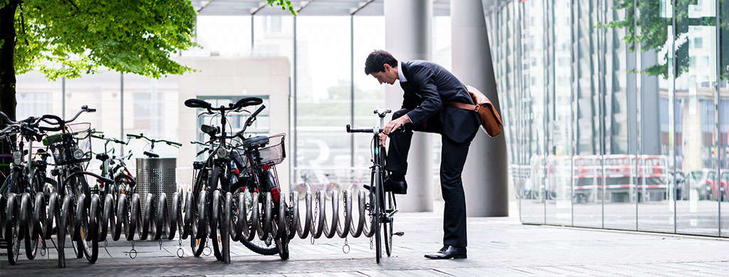 A long black loop cycle rack for bike parking.