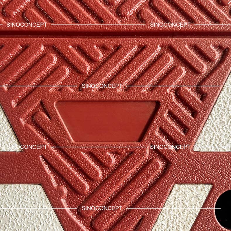 Moulded logo integrated into the red speed cushion surface for brand identification.