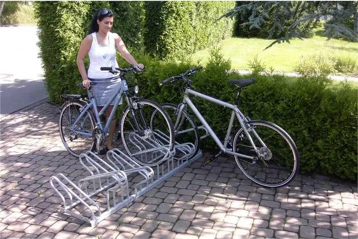 Steel cycle stand used for outdoor bike parking.