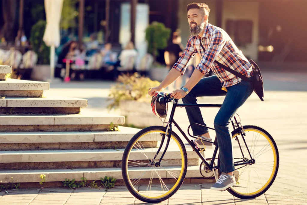 A man is riding a bike.