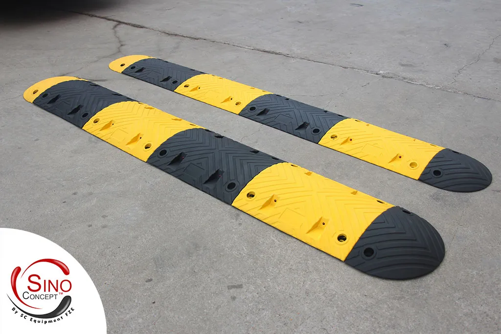 Two black and yellow speed bumps made of vulcanised rubber manufactured by Sino Concept.