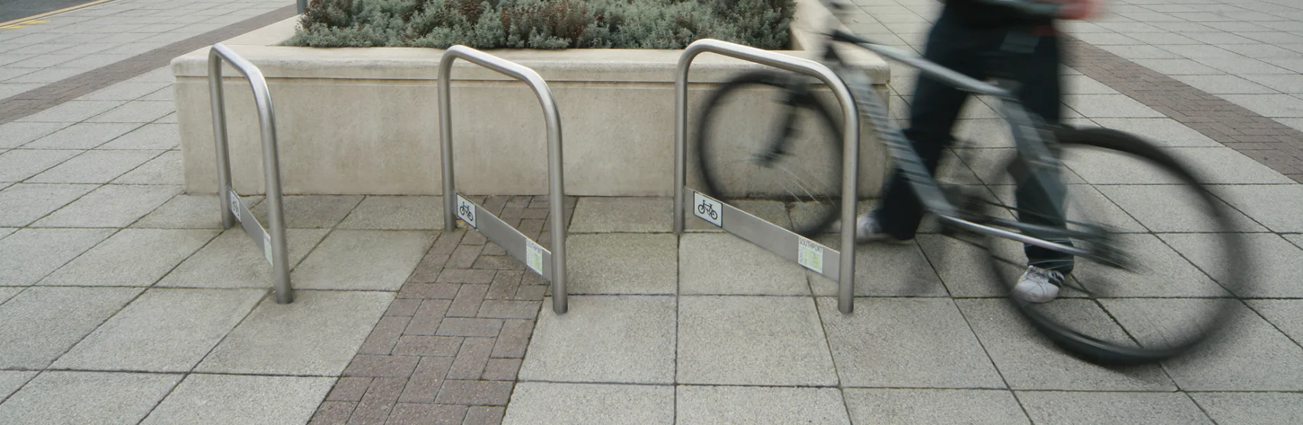 Steel Sheffield cycle stands used for storing or securing bicycles.