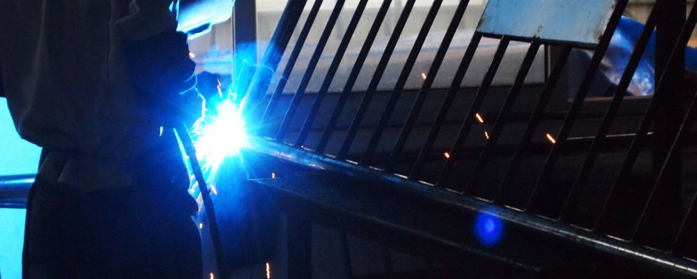 A worker is welding steel products in Sino Concept's steel factory which is located in China.