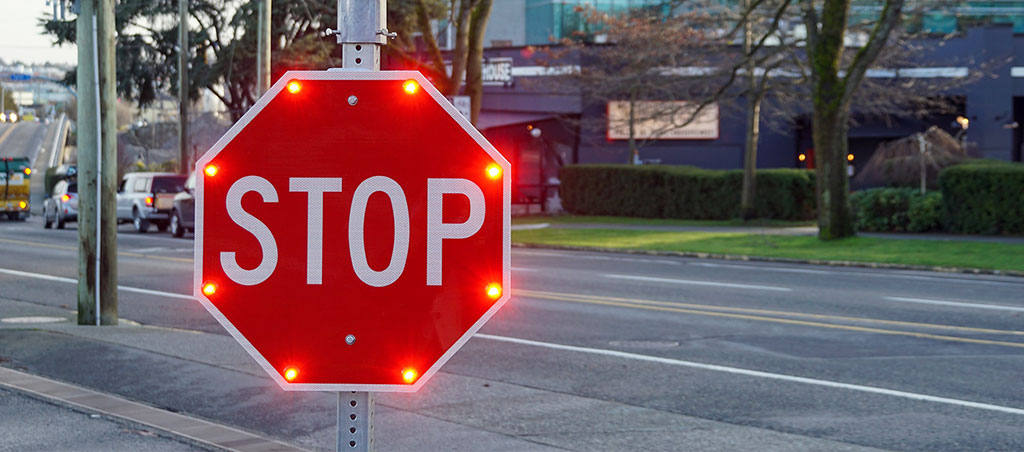 A red stop traffic sign.