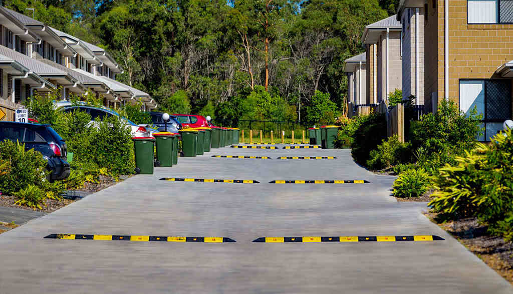 Traffic speed bumps on the road to improve the safety of all road users.