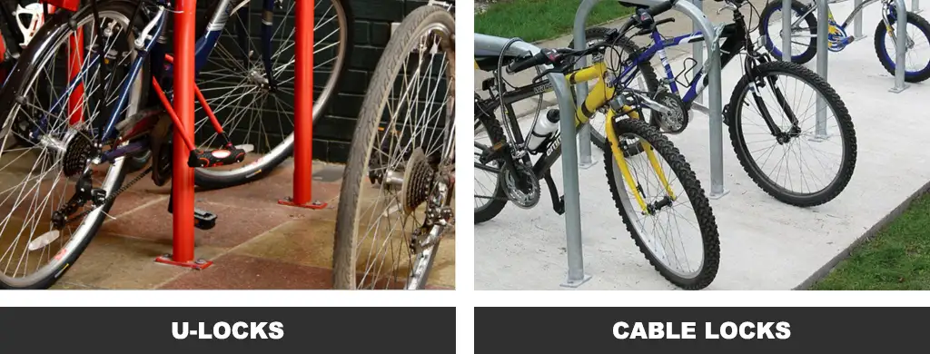 A bicycle is locked with a red U-lock onto a red Sheffield-style bicycle rack, while some other bicycles are secured with cable locks onto steel bicycle racks.